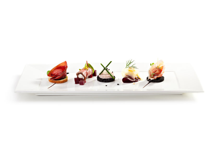 30297858 - meat canapes on white dish